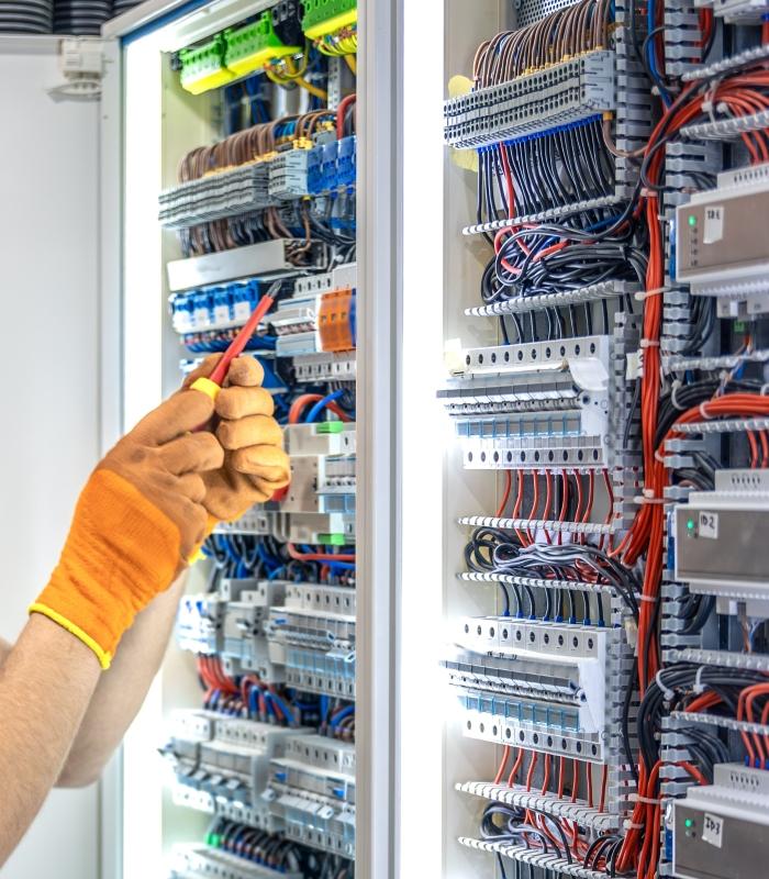 male-electrician-working-electrical-panel-male-electrician-overalls.jpg